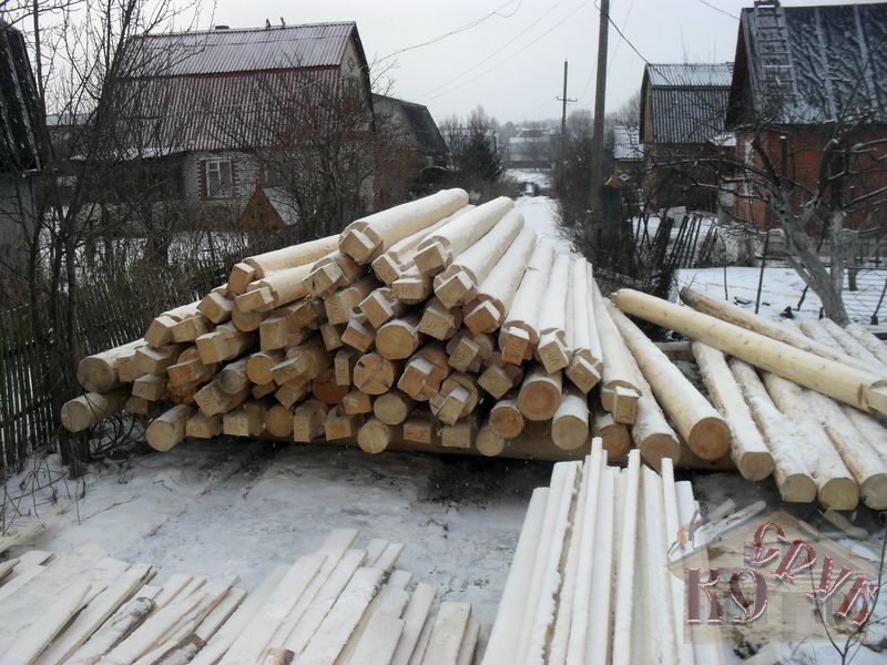 Дом из бревна в лапу